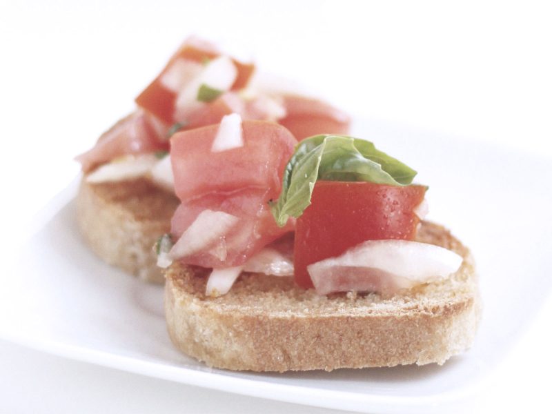 Diced tomato, olive oil, garlic and fresh basil on toast